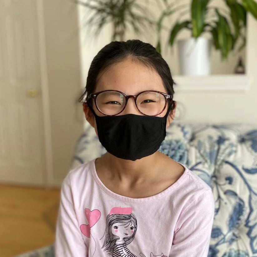 
                  
                    Young girl wearing X-STATIC mask
                  
                